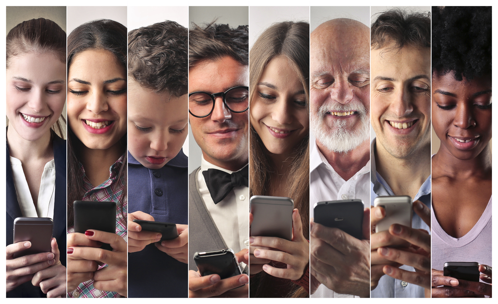 importance of personalization in marketing as shown in this image showing the happy faces of different types of people browsing their mobile phones